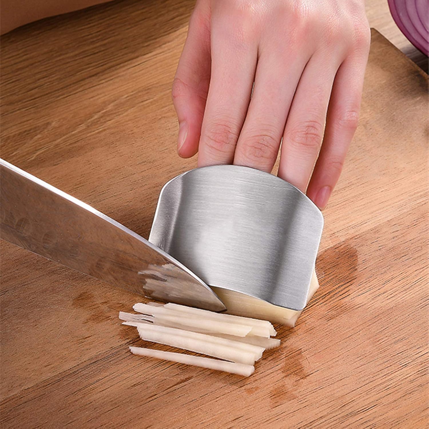 Safety-First Stainless Steel Finger Guards for Kitchen Use